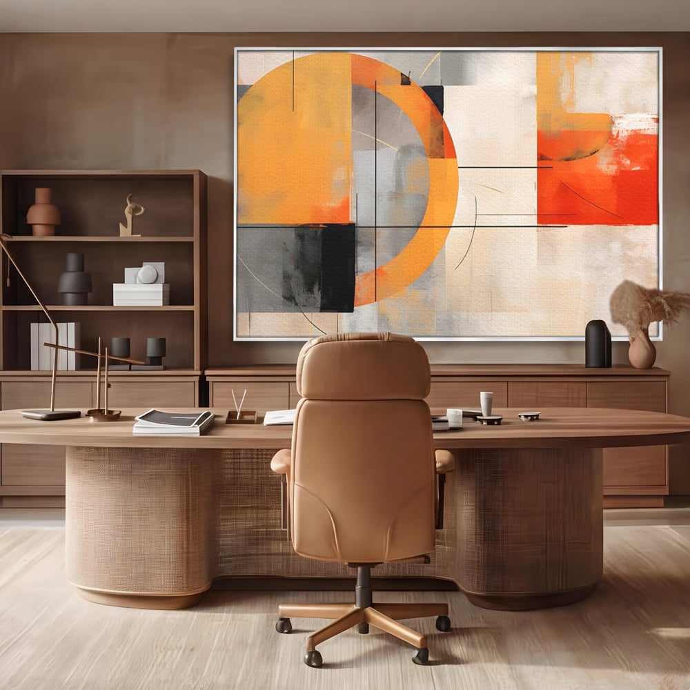 Tablou canvas cu pictura abstracta cu cerc galben, in rama de aluminiu argintiu, pe perete intr-un birou
